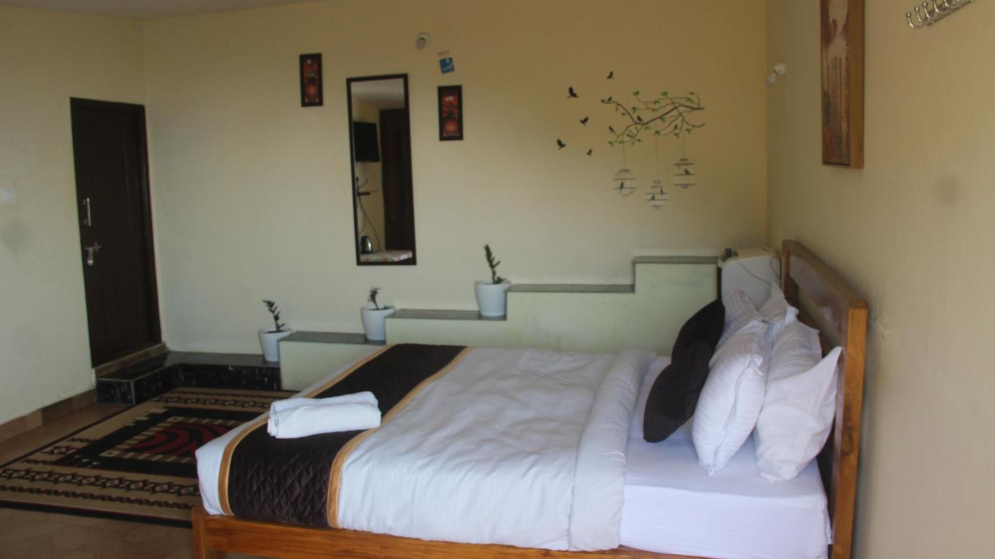 Kollanoor Guest House 马迪凯里 客房 照片